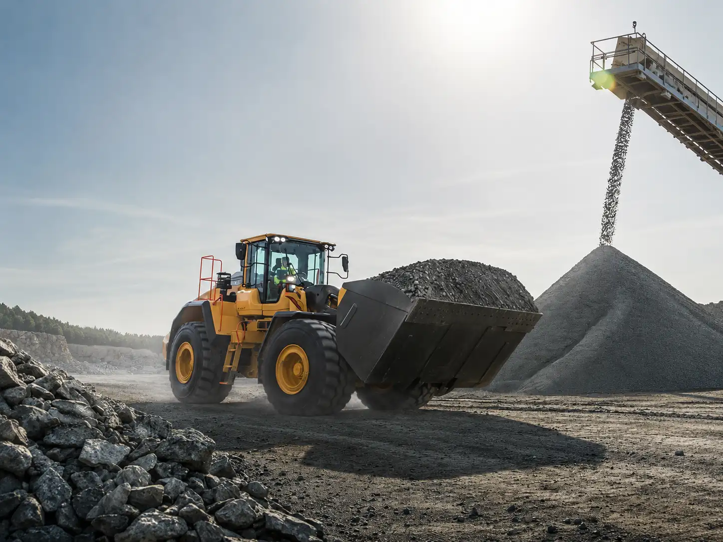 Yellow wheel loader at a quarry